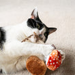 Load image into Gallery viewer, Cat playing with the Feline Frenzy Fog City Pet x P.L.A.Y. Mystic Mushrooms Toy Set on a light-colored surface
