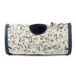 Load image into Gallery viewer, Feline Frenzy Purr &amp; Pounce Cat Tunnel in Navy Blue Celestial print shown - side view - with dangling mouse toy sitting on top of it beside the peephole on a white background.
