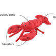 Load image into Gallery viewer, Play’s Ocean Buddies Lemmy the Lobster, a red plush lobster toy with labeled features on a white background
