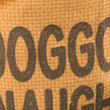 Load image into Gallery viewer, P.L.A.Y. Home for the Holidays Fur-Ever Naughty Toy - close up of text Doggone Naughty
