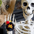 Load image into Gallery viewer, P.L.A.Y. Feline Frenzy Killer Cat Kitty-Boom Toy Set - bomb toy in skeleton's hand ready to be launched
