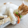 Load image into Gallery viewer, P.L.A.Y.'s Feline Frenzy Kicker - Shrimp Purrito Toy - ginger cat sniffing the top of the purrito toy
