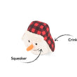 Load image into Gallery viewer, A plush snowman toy from the Play Merry Minis Collection with a red and black buffalo plaid hat, white fuzzy face, black embroidered eyes and nose, and a carrot nose, shown on a white background with callout labels reading 'Squeaker' and 'Crinkle'.
