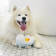 Load image into Gallery viewer, P.L.A.Y. Splish Splash Collection - Rub-a-dub-Tub Toy - white fluffy dog smiling in front of tub with toy in between paws

