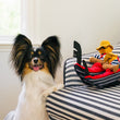 Load image into Gallery viewer, P.L.A.Y. Totally Touristy Giuseppe’s Gondola - both sizes sitting on a blue and white striped chair with little fluffy pup smiling next to them
