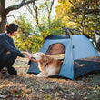 Load image into Gallery viewer, Scout &amp; About Landscape Series Outdoor Dog Tent by P.L.A.Y. -  human and dog enjoying Eclipse tent in middle of the woods
