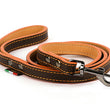 Load image into Gallery viewer, Napoli Leashes by P.L.A.Y. - orange and brown leash rolled up
