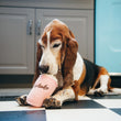 Load image into Gallery viewer, P.L.A.Y. American Classic Mutts Milkshake Toy - Basset Hound laying on checkered kitchen floor looking like he's drinking from the milkshake
