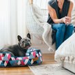 Load image into Gallery viewer, Mosaic Lounge Bed by P.L.A.Y. in Soda Pop with Frenchie inside looking up to camera in bedroom
